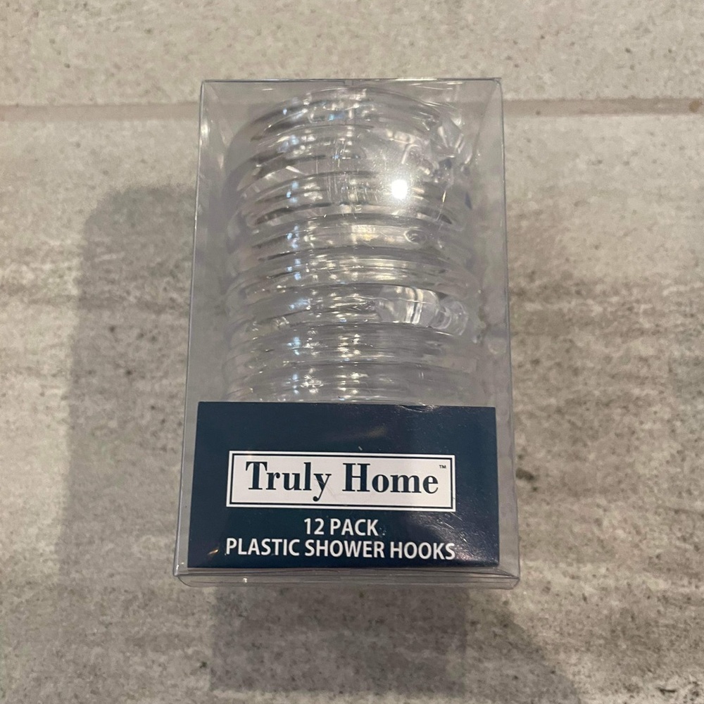 Plastic shower hooks.